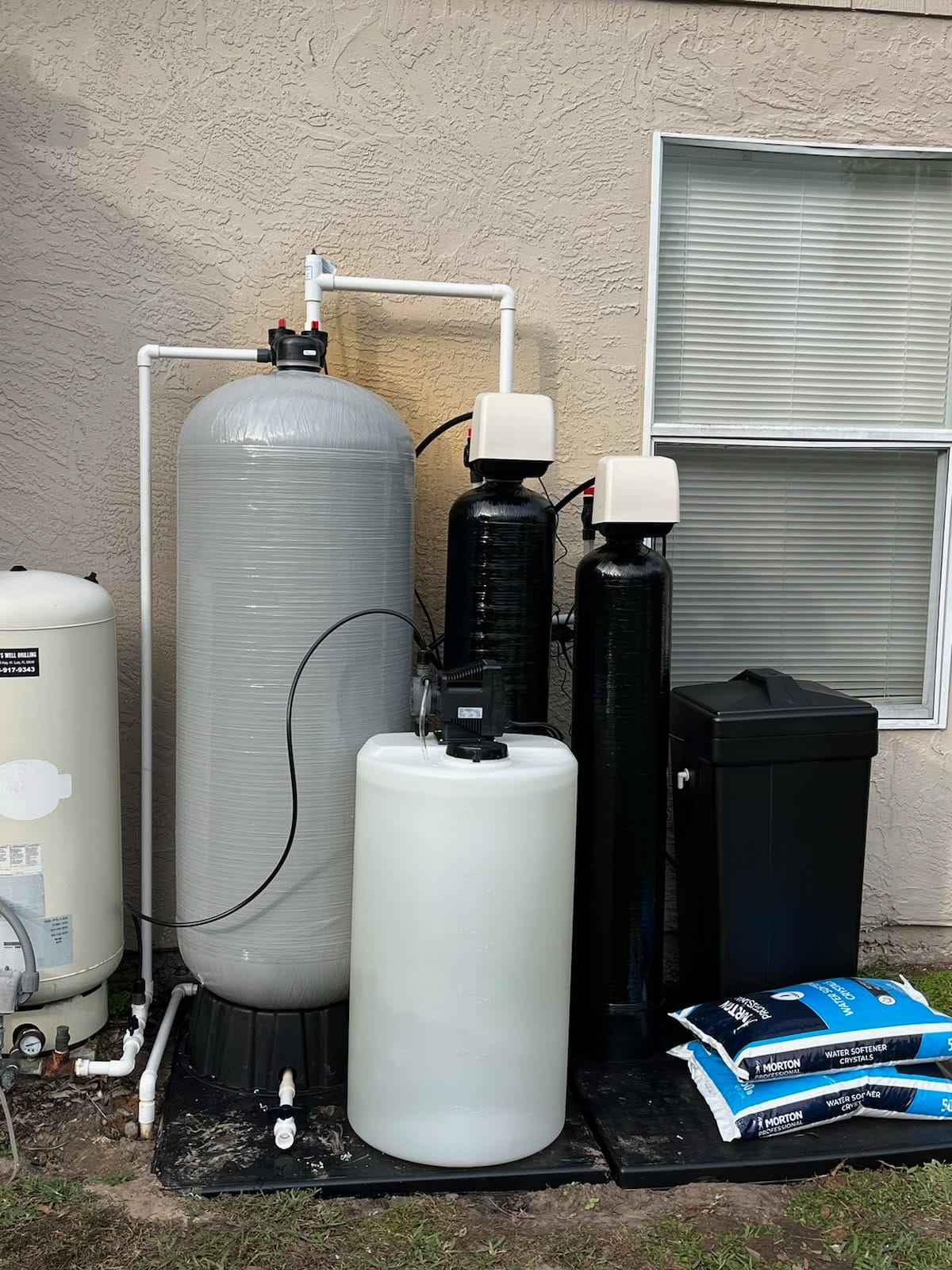 Well Water Filtration System Installed Outside a Home
