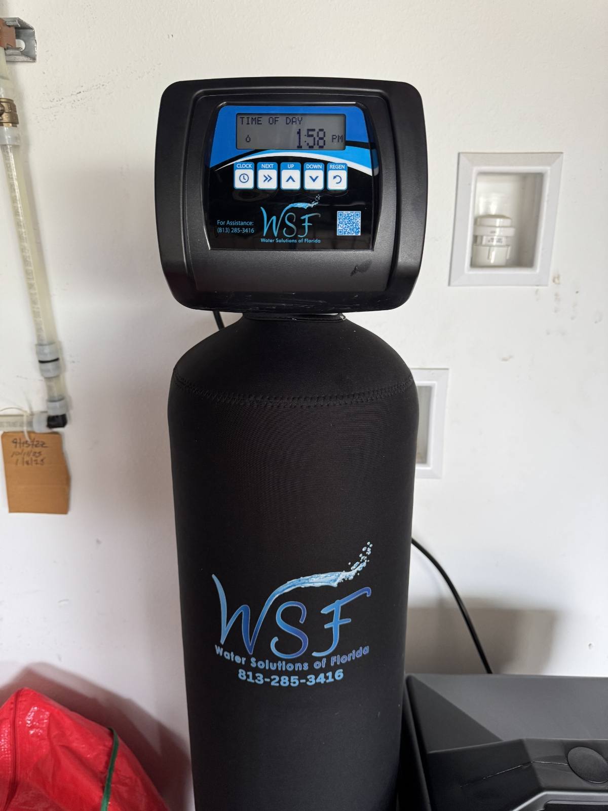 Water Solutions of Florida water softener system in home installation
